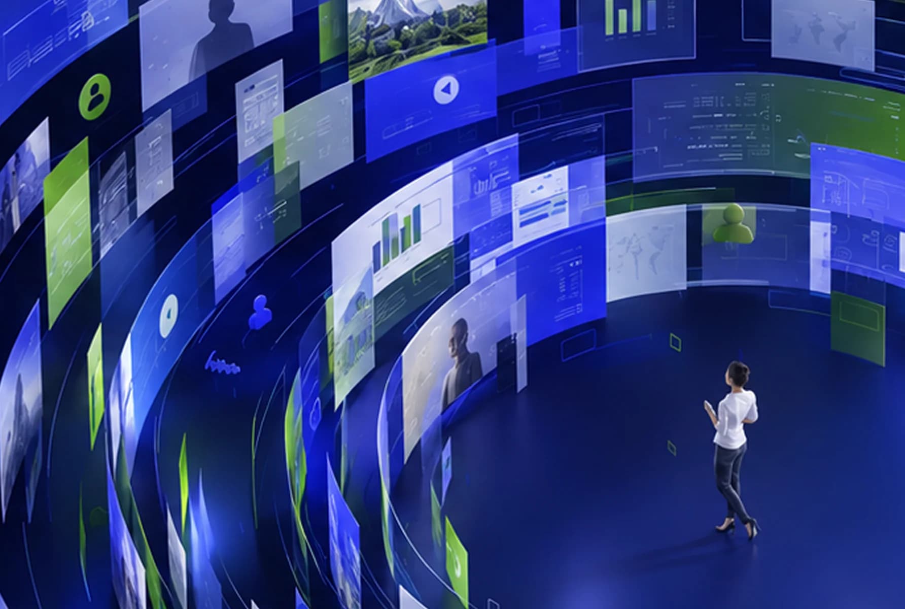 A person standing inside a ring of media screens
