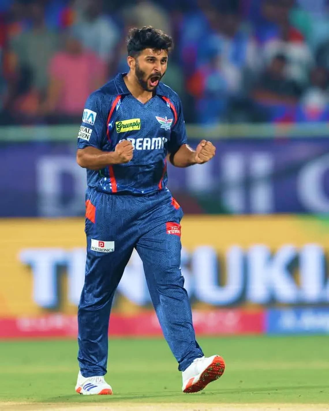 A bowler celebrating a wicket