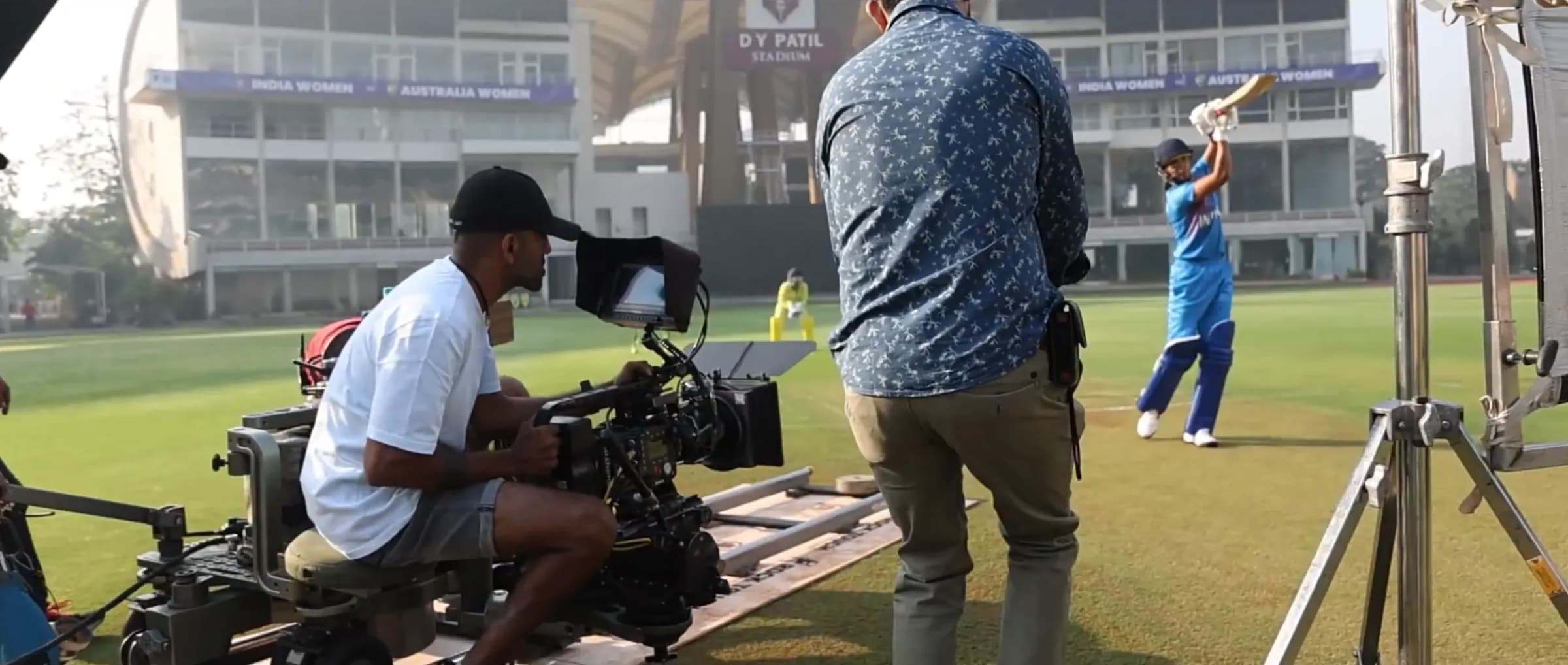 A camera crew filming a match
